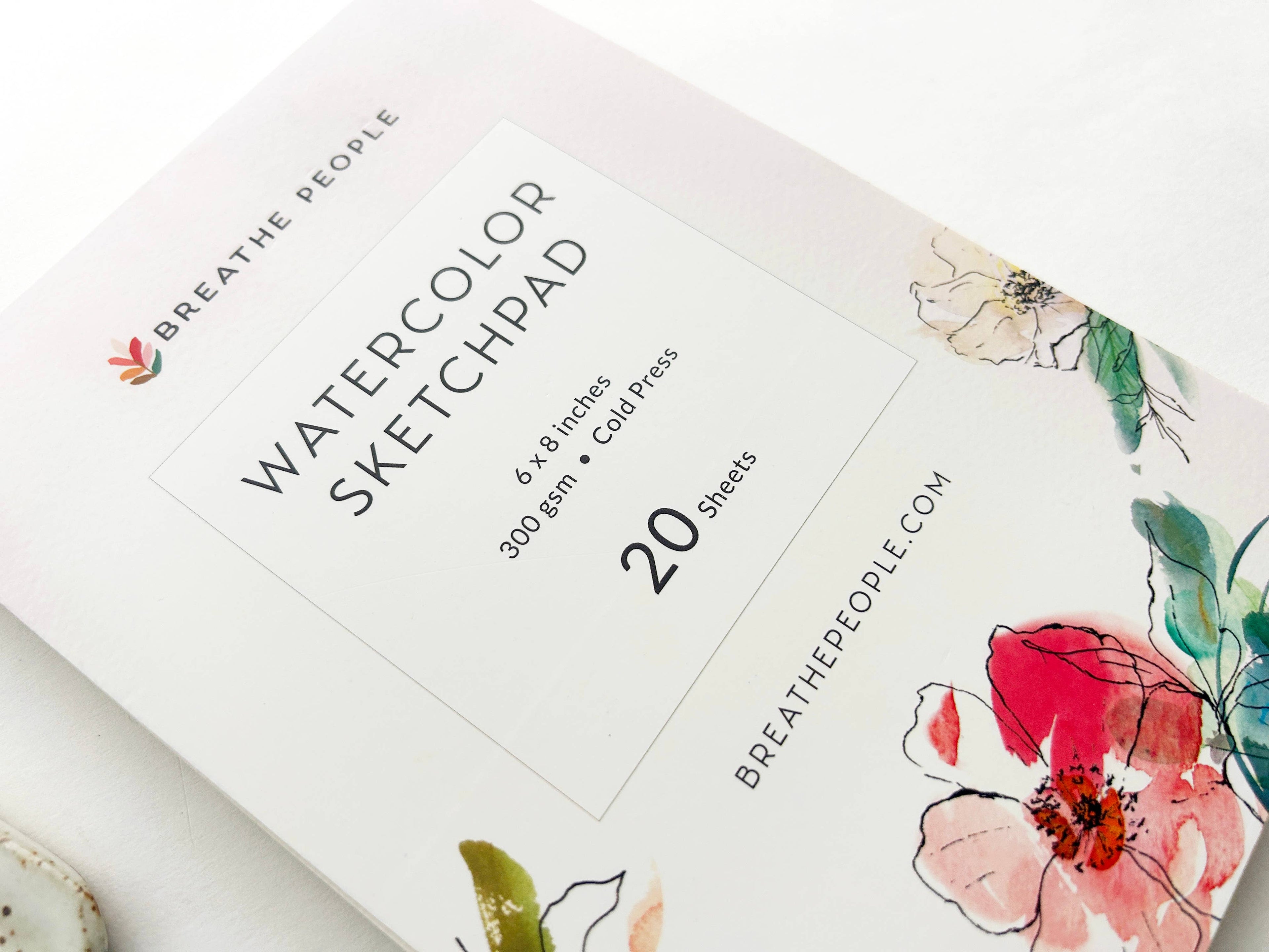 Breathe People watercolor sketchpad with floral design