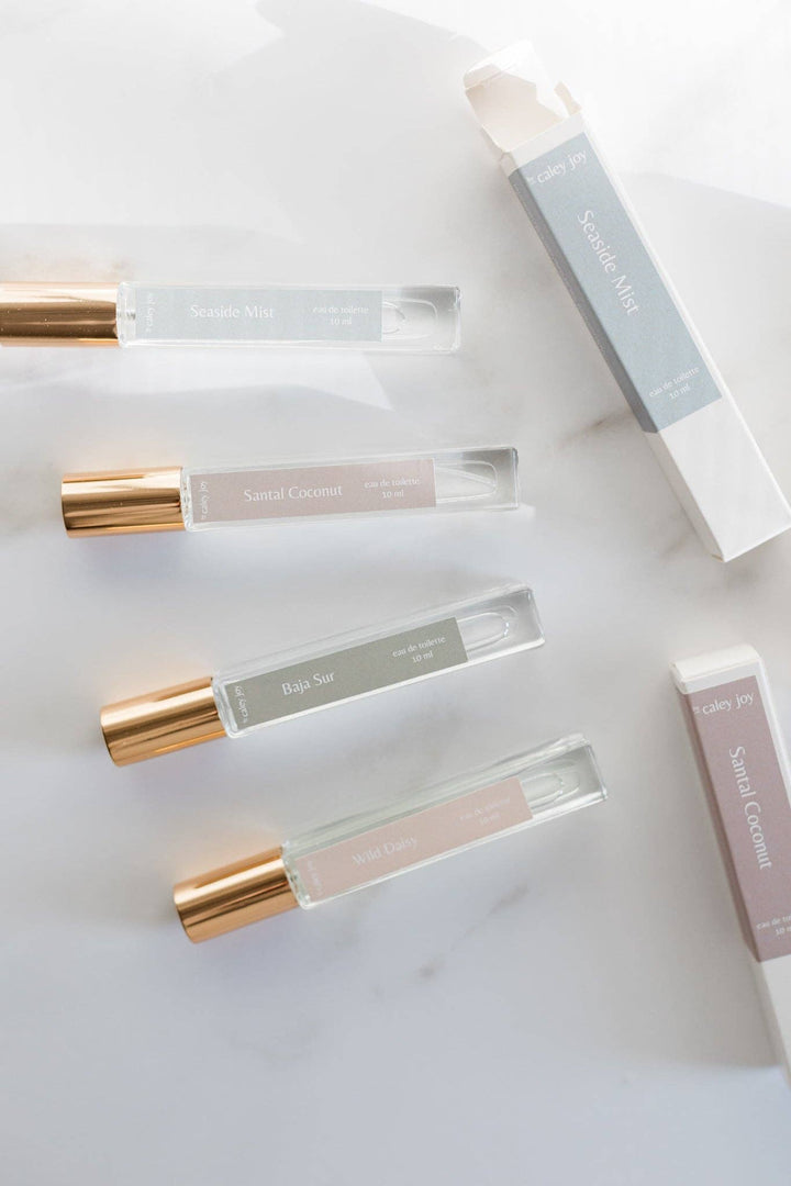 Set of small perfume bottles with gold caps