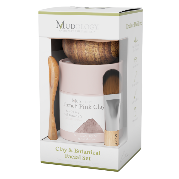 Mudology facial set packaging with pink jar, brush, and bowl