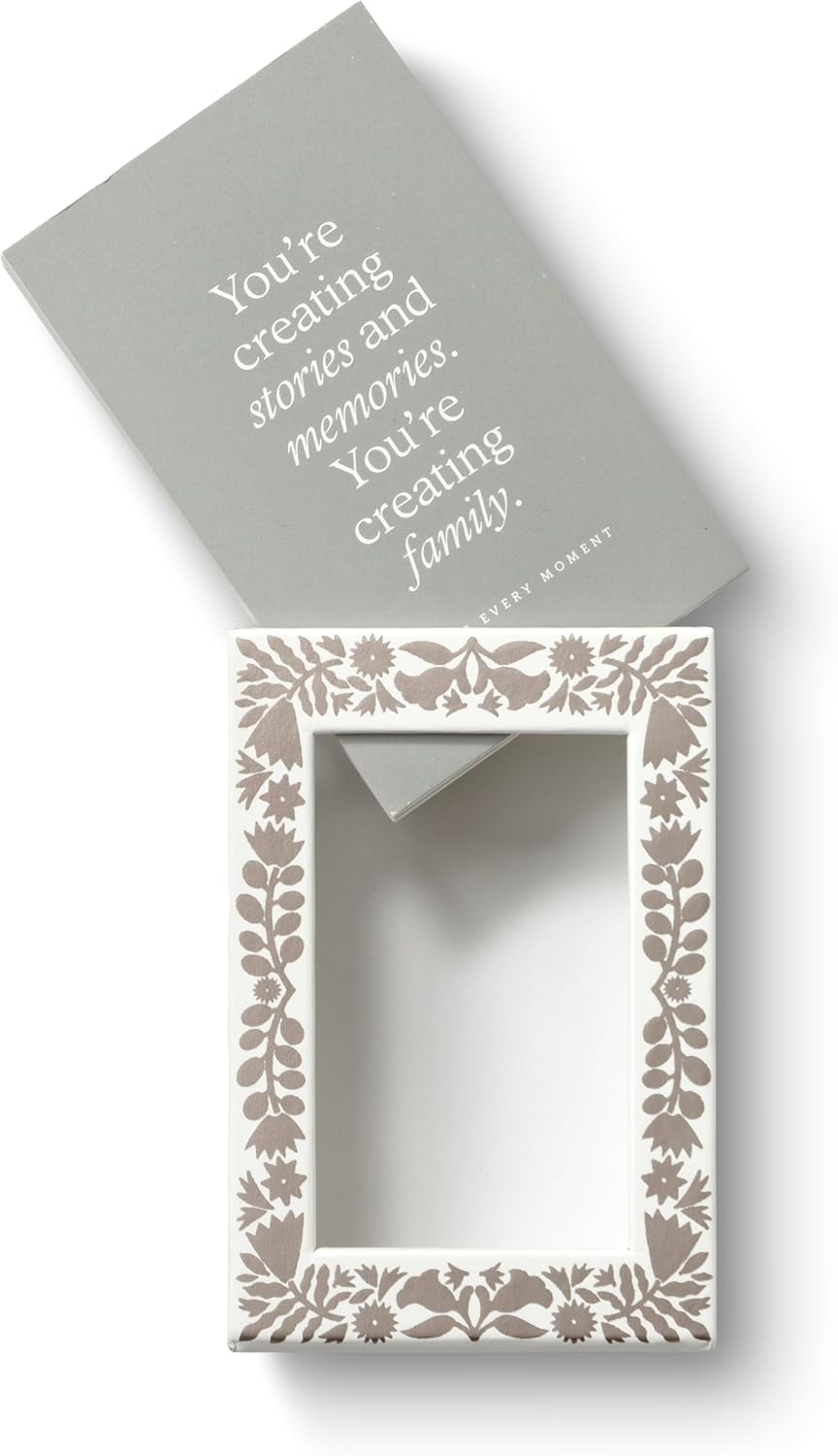 Decorative picture frame with floral design and a motivational quote