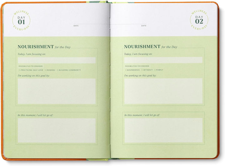 Open planner with daily journal entries on green pages