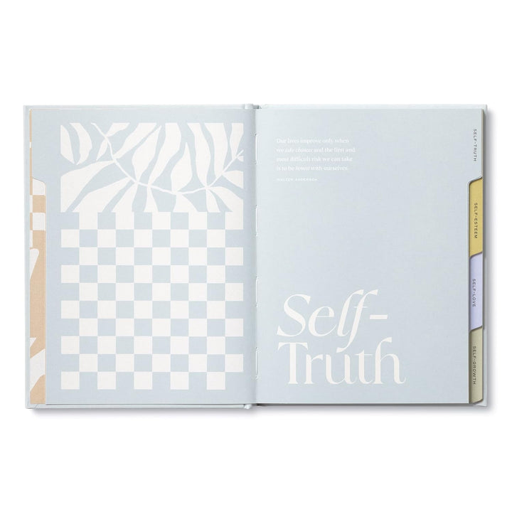 Open book with geometric patterns and the word 'Self-Truth'