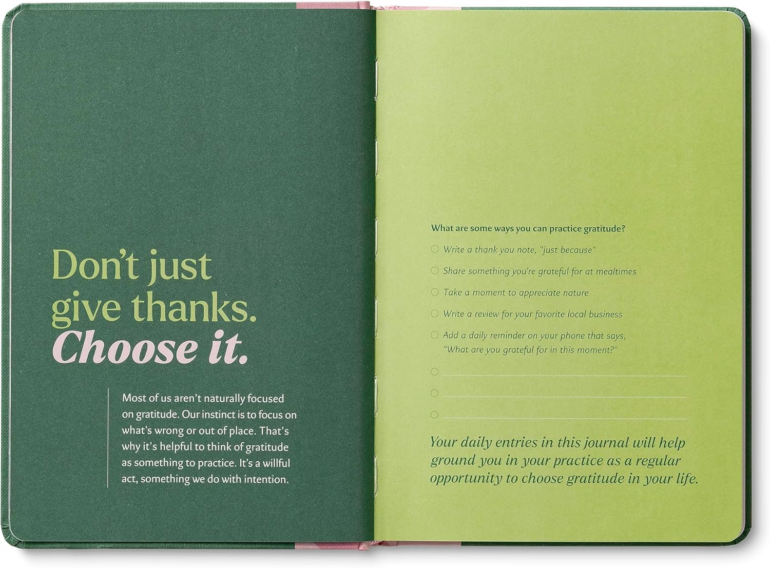 Open journal with green and white text