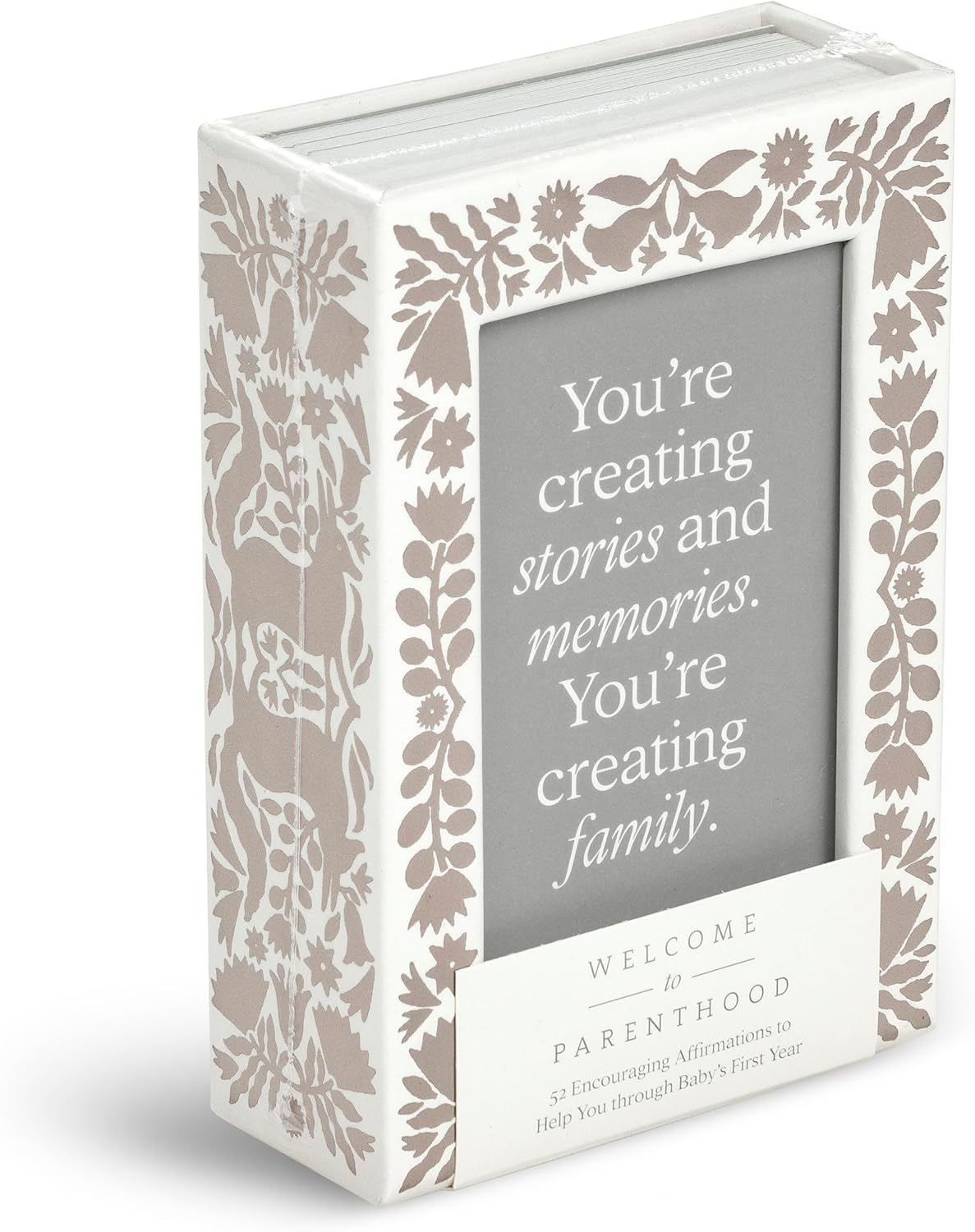 Decorative box with floral patterns and text about creating stories, memories, and family.