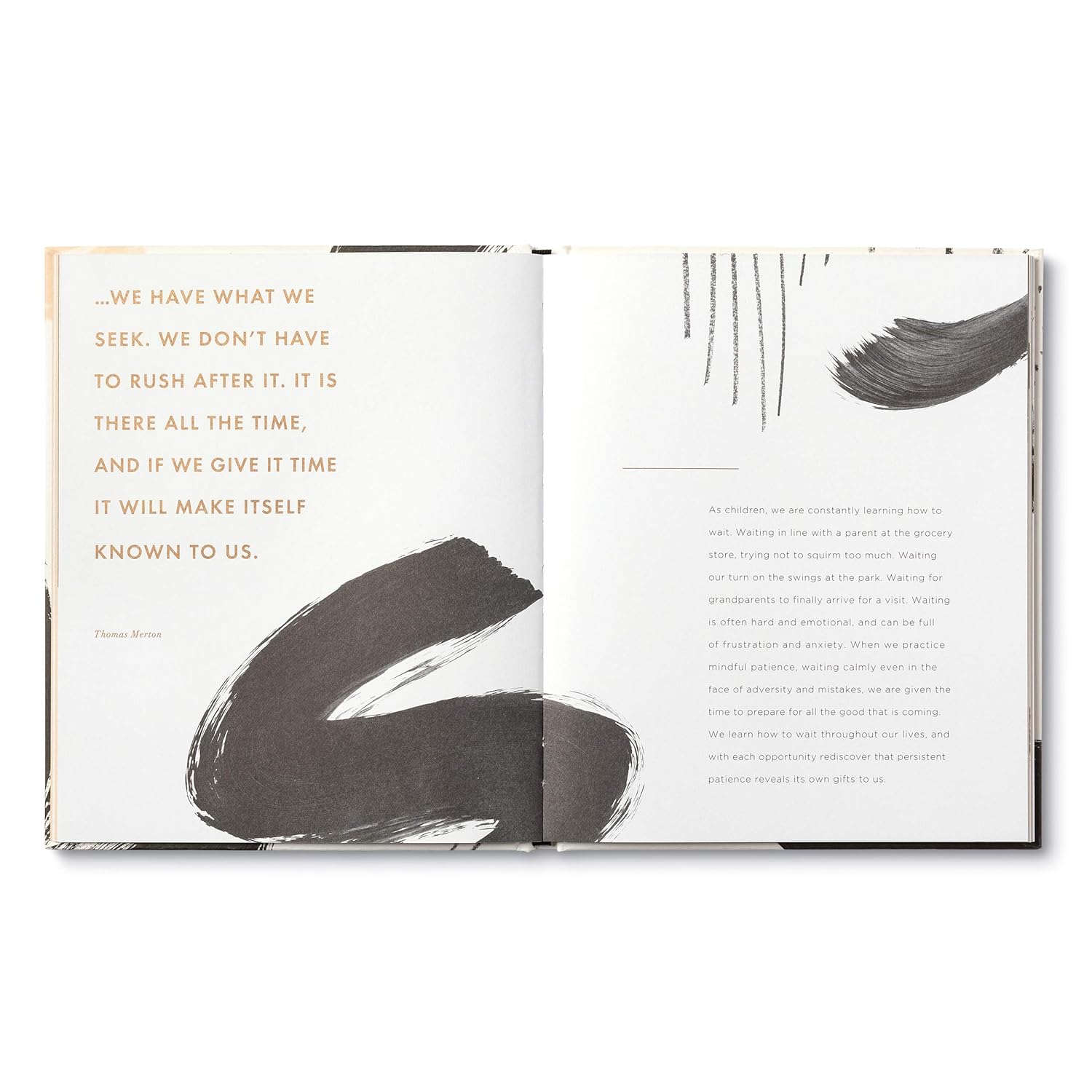 Open book with text and abstract black brush strokes