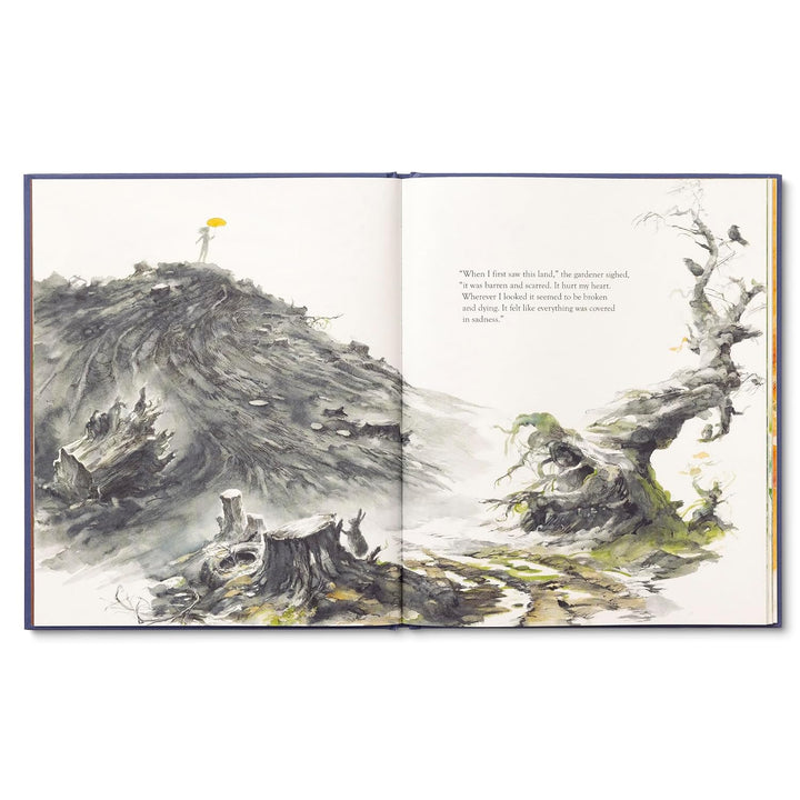 Open book with illustrations of a landscape and text
