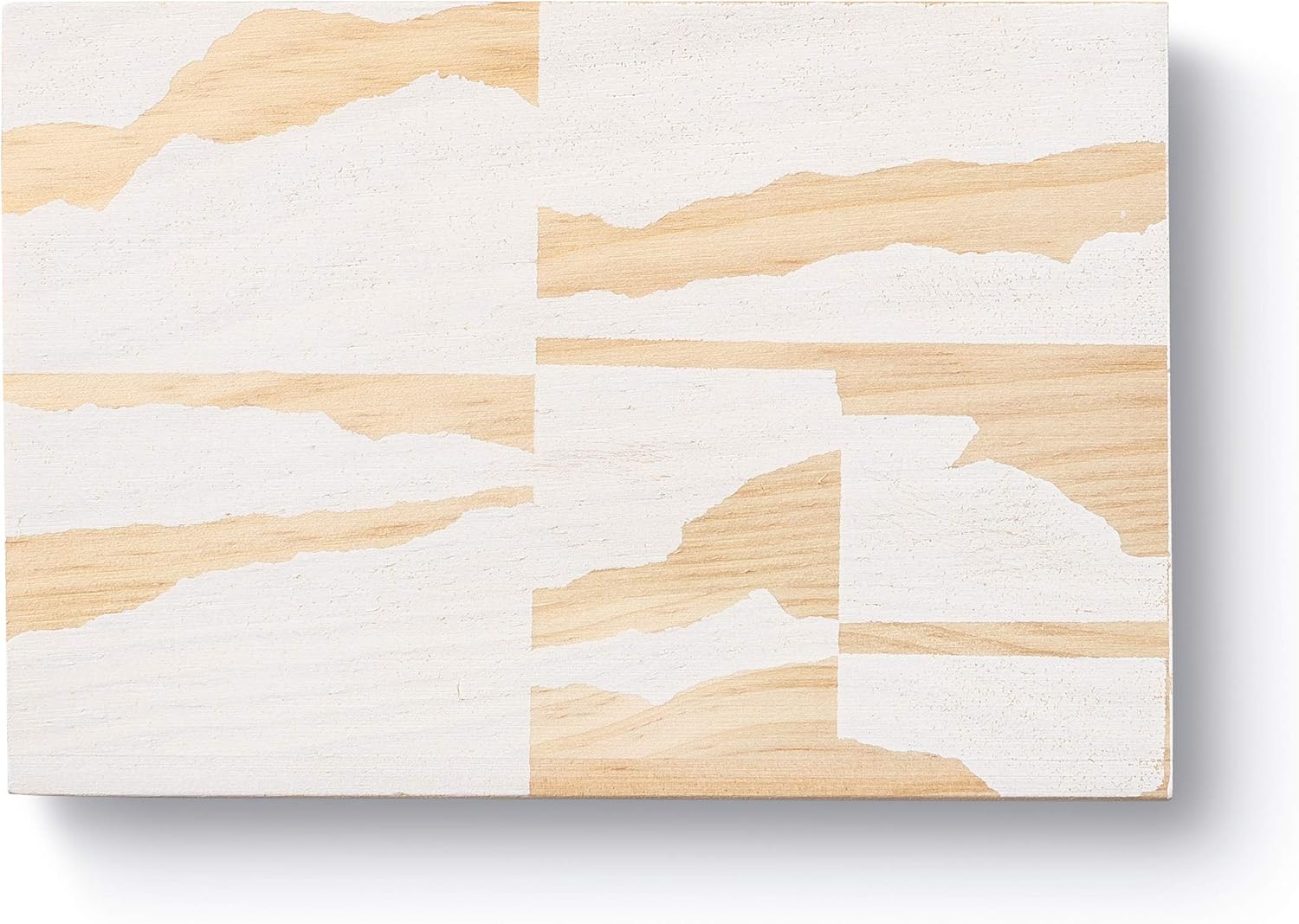 Wooden cutting board with white abstract patterns