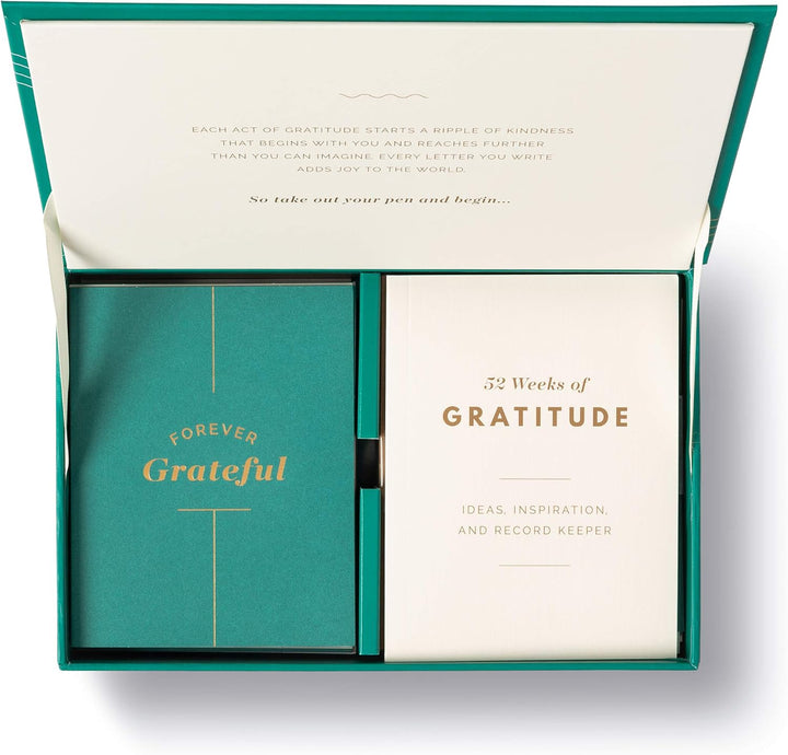 Open box containing a gratitude journal and pen with text
