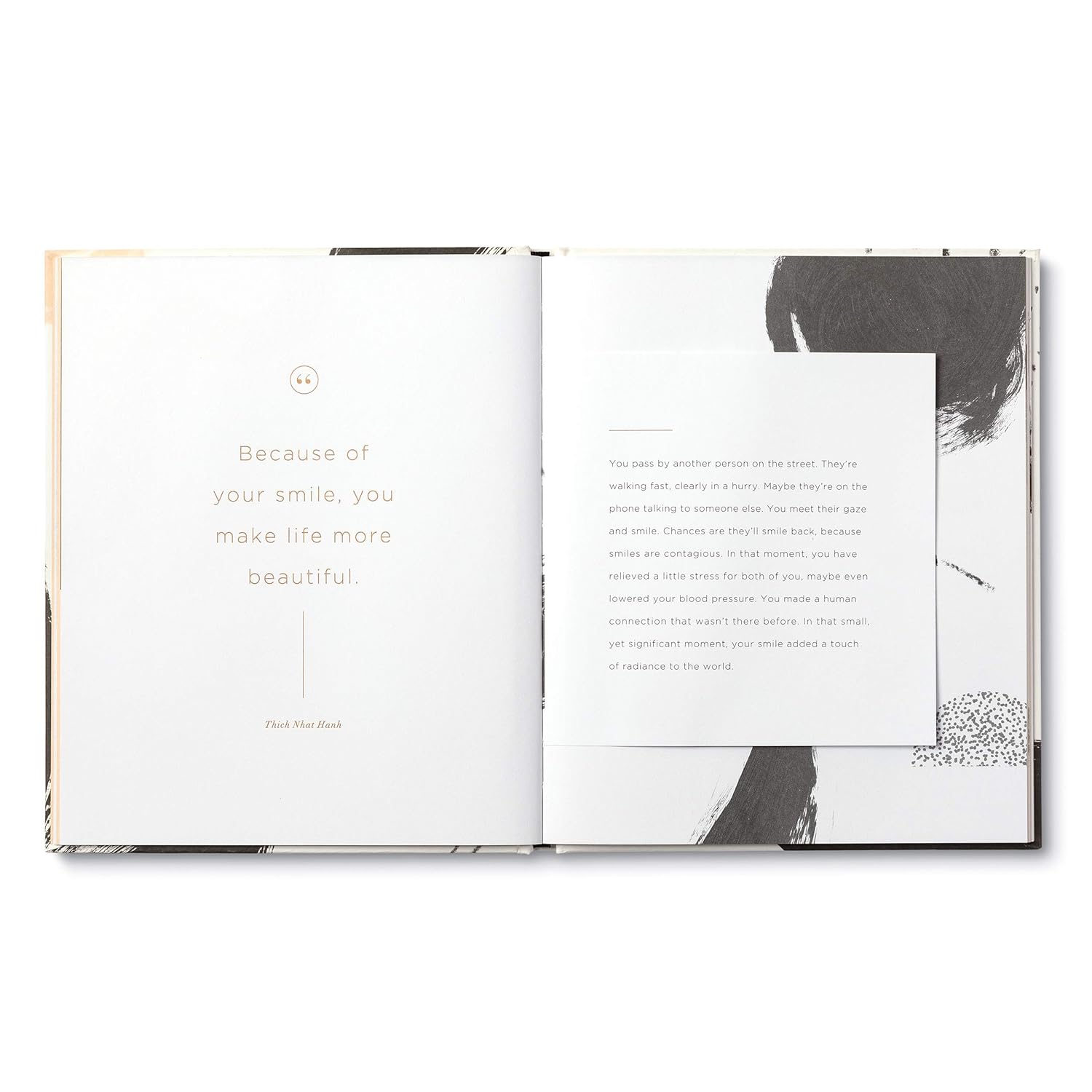 Open book with text and a black and white photo