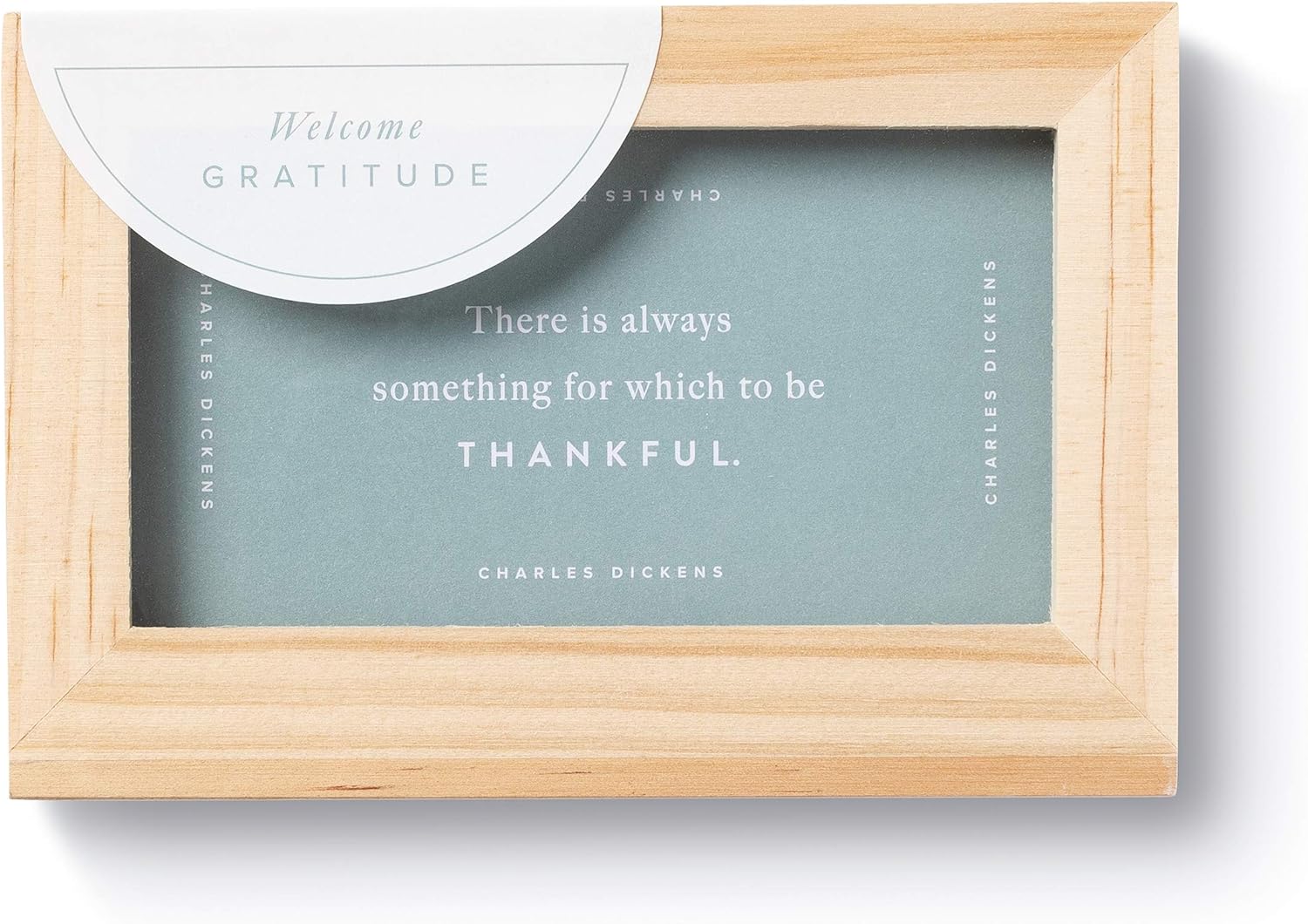 Wooden picture frame with a quote by Charles Dickens