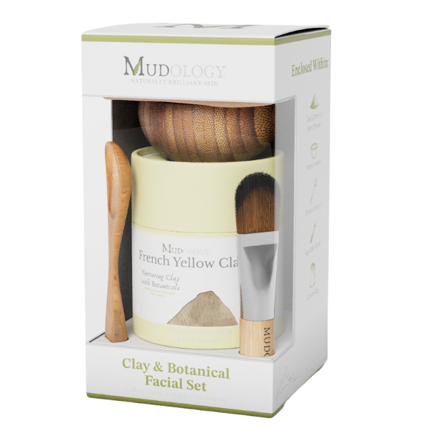 Mudology facial set packaging with a jar, brush, and spatula