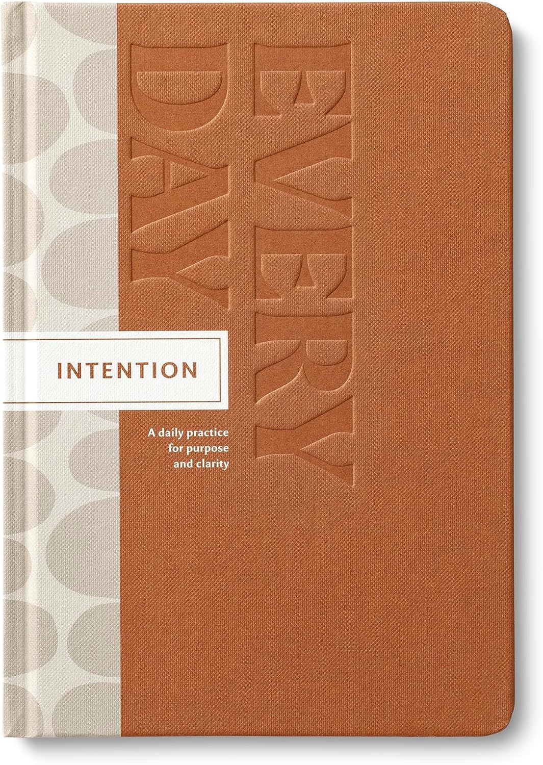 Brown journal with embossed text and white label