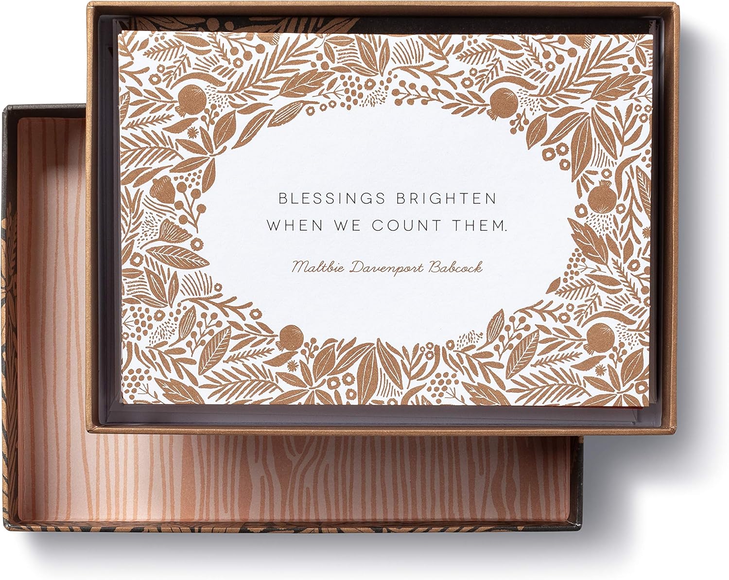 Decorative box with floral pattern and text