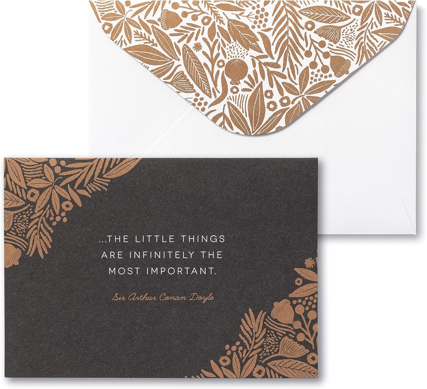 Black card with gold floral design and quote, paired with a matching envelope