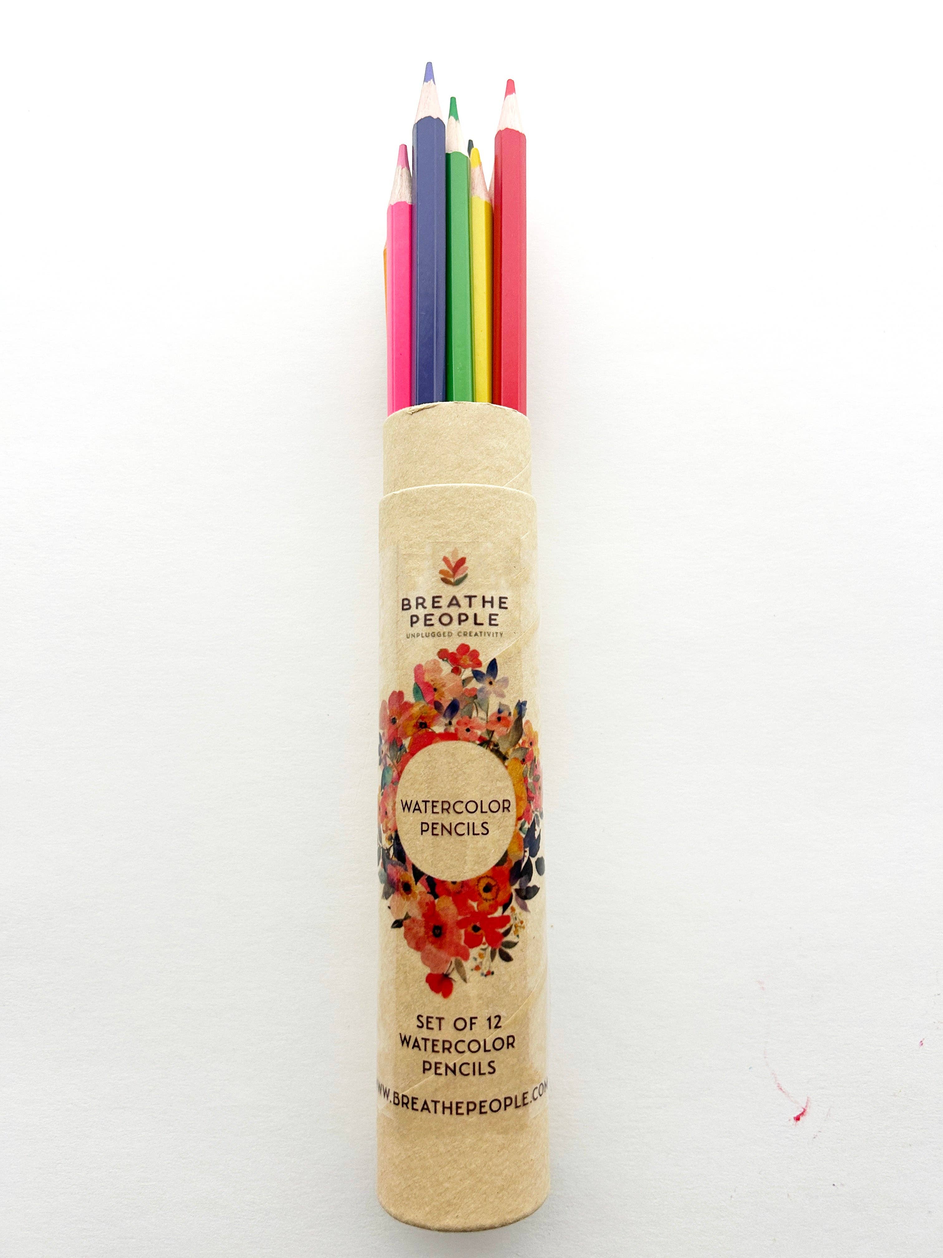 Set of watercolor pencils in a cylindrical holder with 'Breathe People'