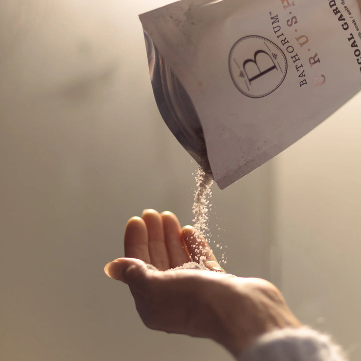 Hand receiving a small amount of product
