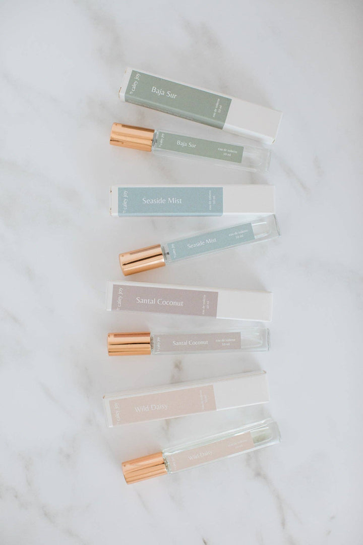 Set of small glass bottles with gold caps