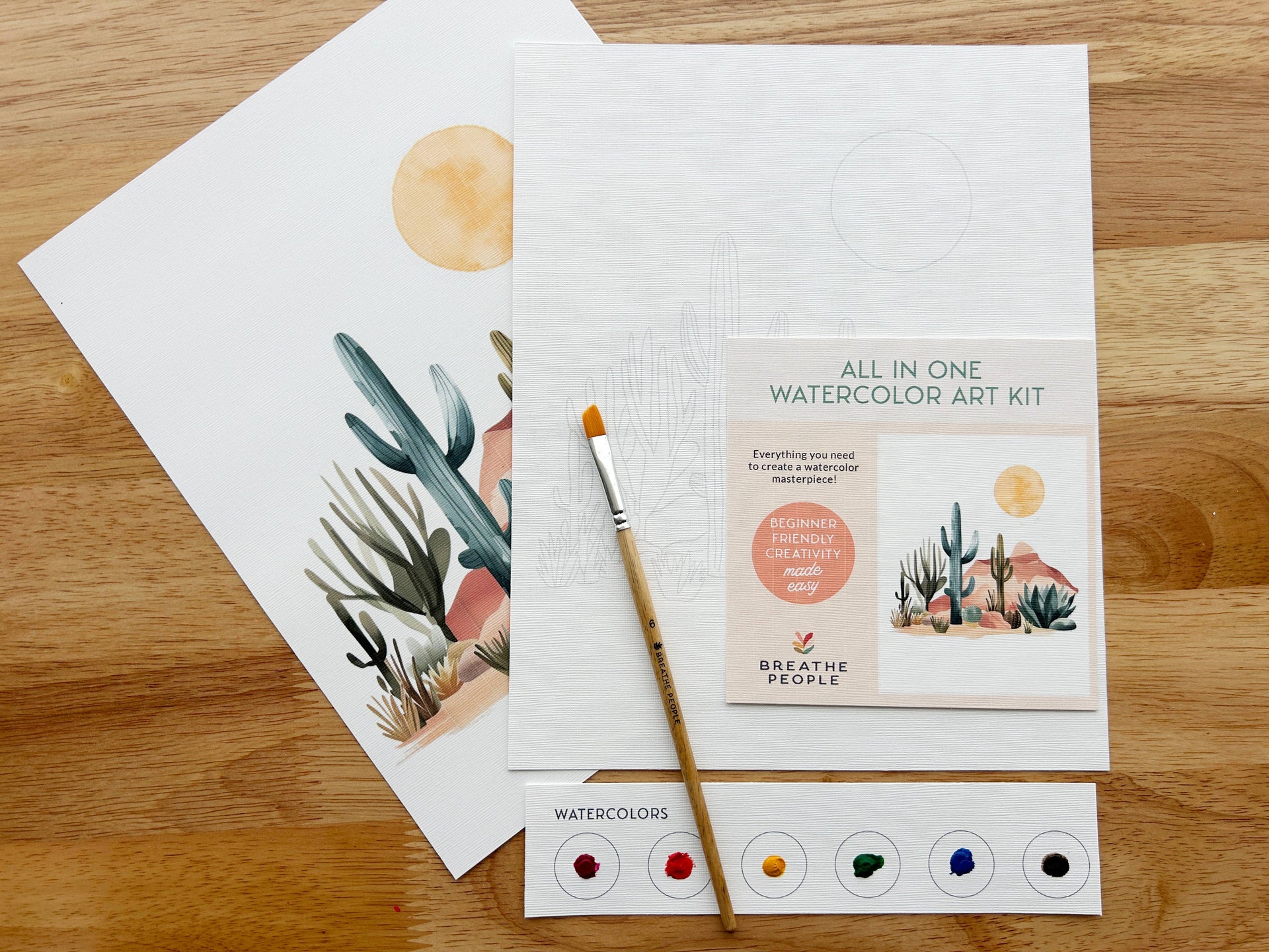 Watercolor art kit with cards and a brush