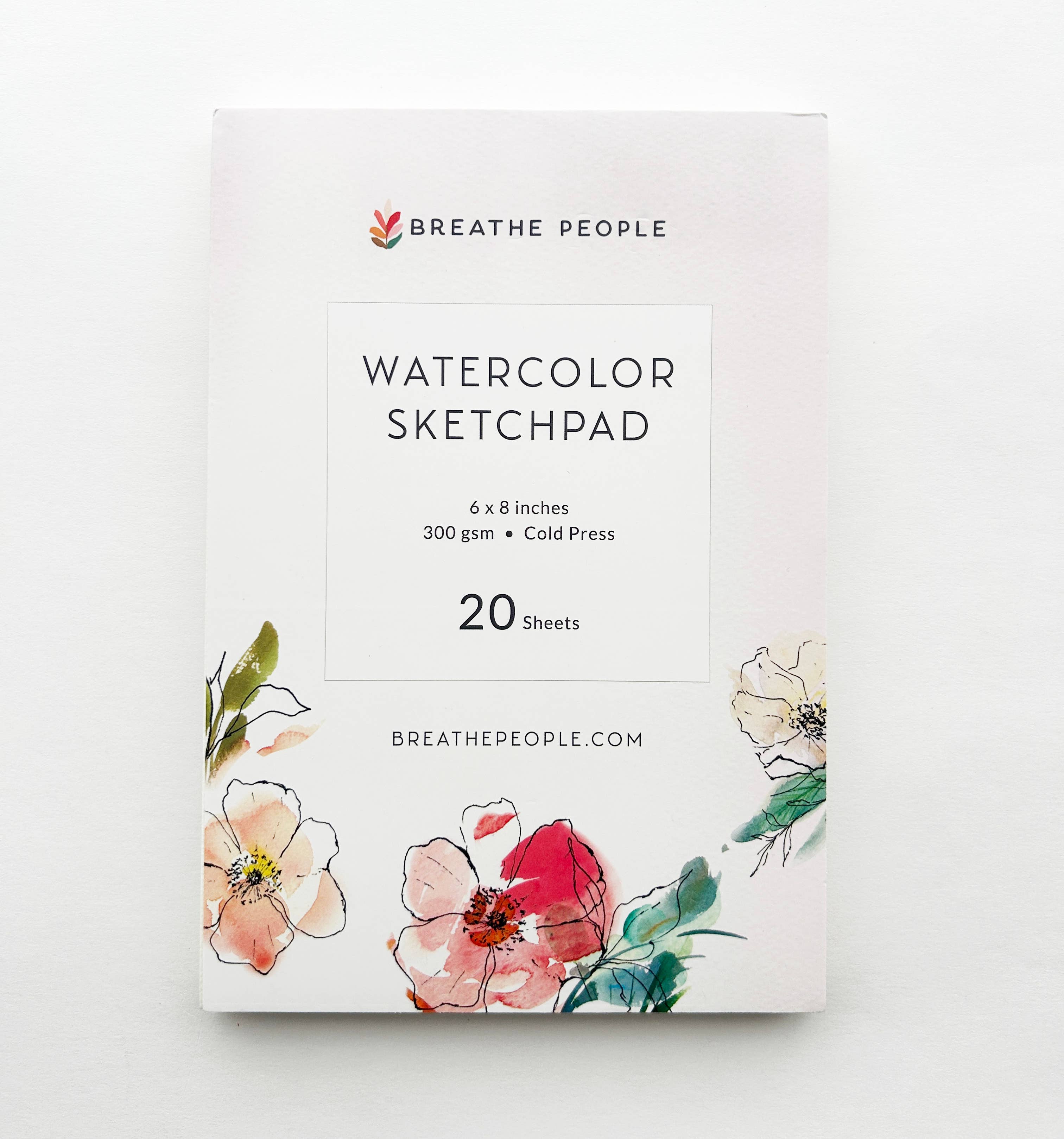 Watercolor sketchpad with floral design