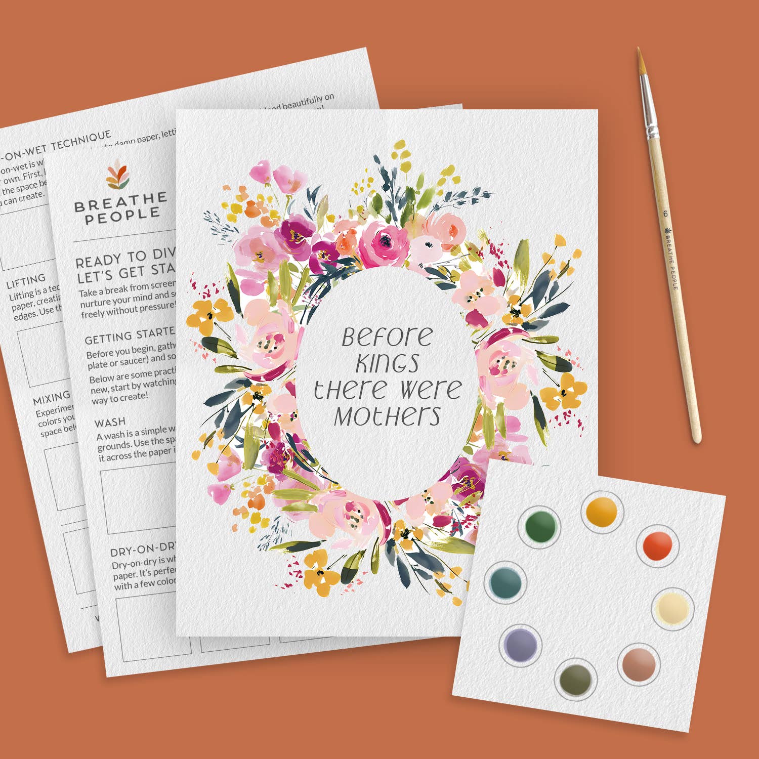 Floral design print with 'Before kings there were mothers' text on a brown background