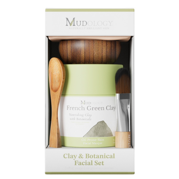 Mudology French Green Clay facial set in packaging with a wooden spoon and mask.