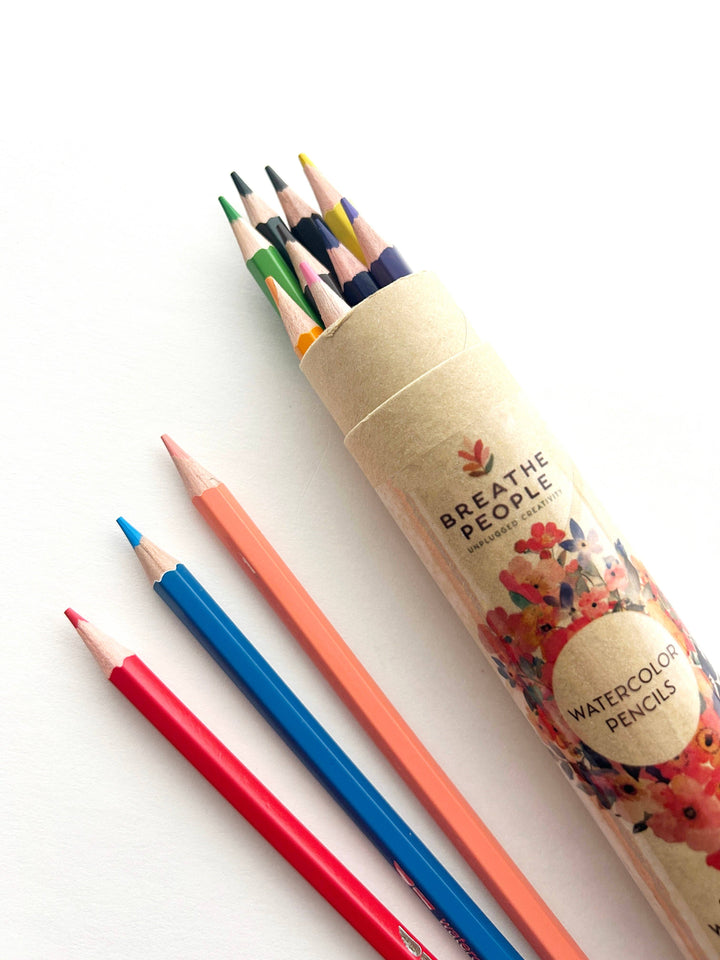 Set of watercolor pencils with a cylindrical packaging