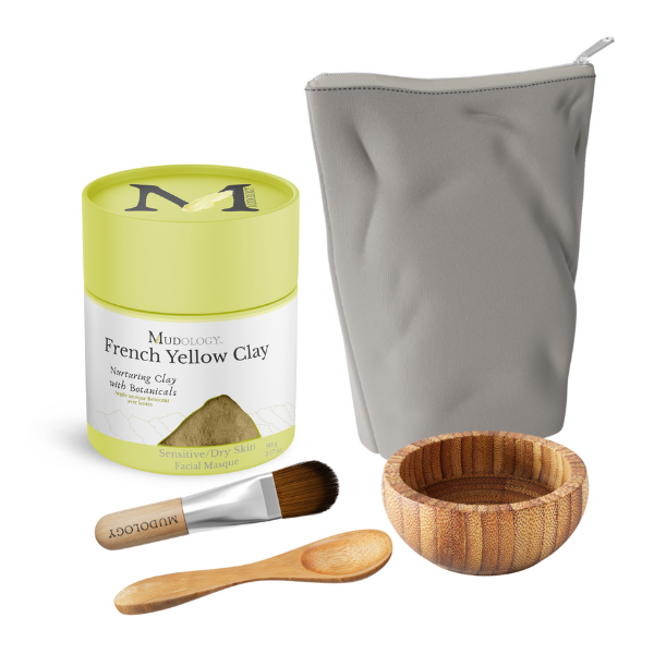 Mudology French Yellow Clay kit with a gray pouch, wooden bowl, brush