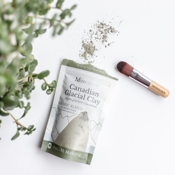 Canadian Glacial Clay facial masque package with a brush and greenery