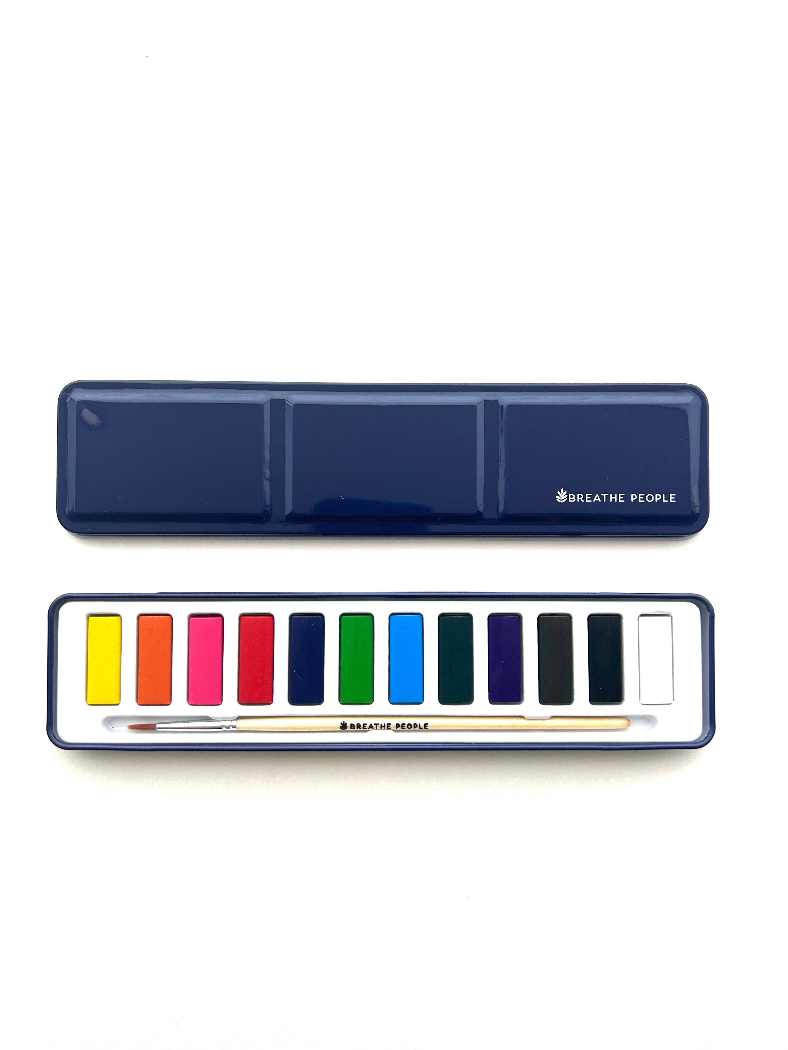 Colorful watercolor set with a dark blue case