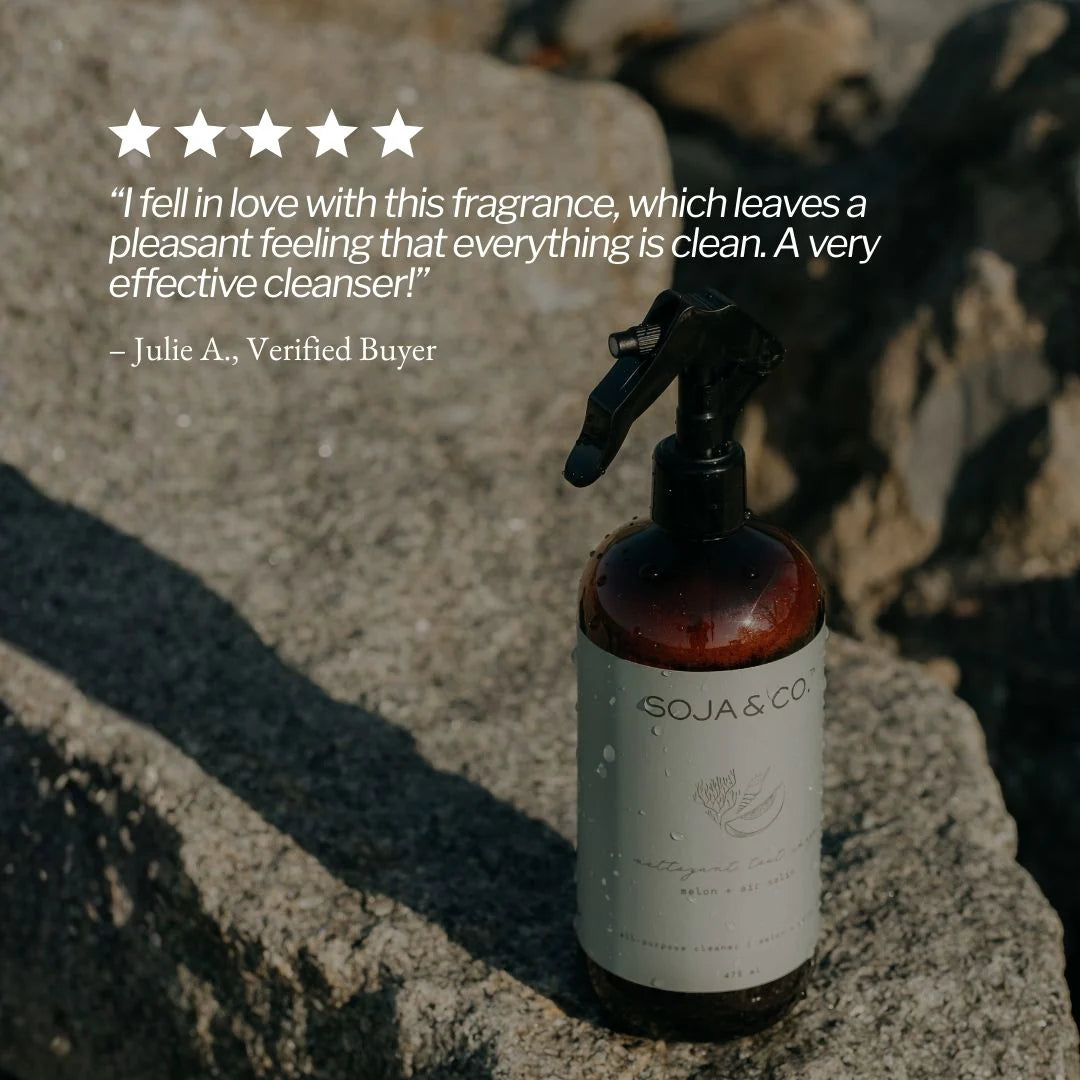 Bottle of GOJA & CO cleaner on a stone